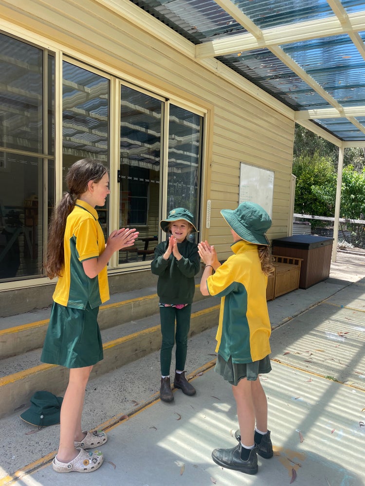 students playing clapping game