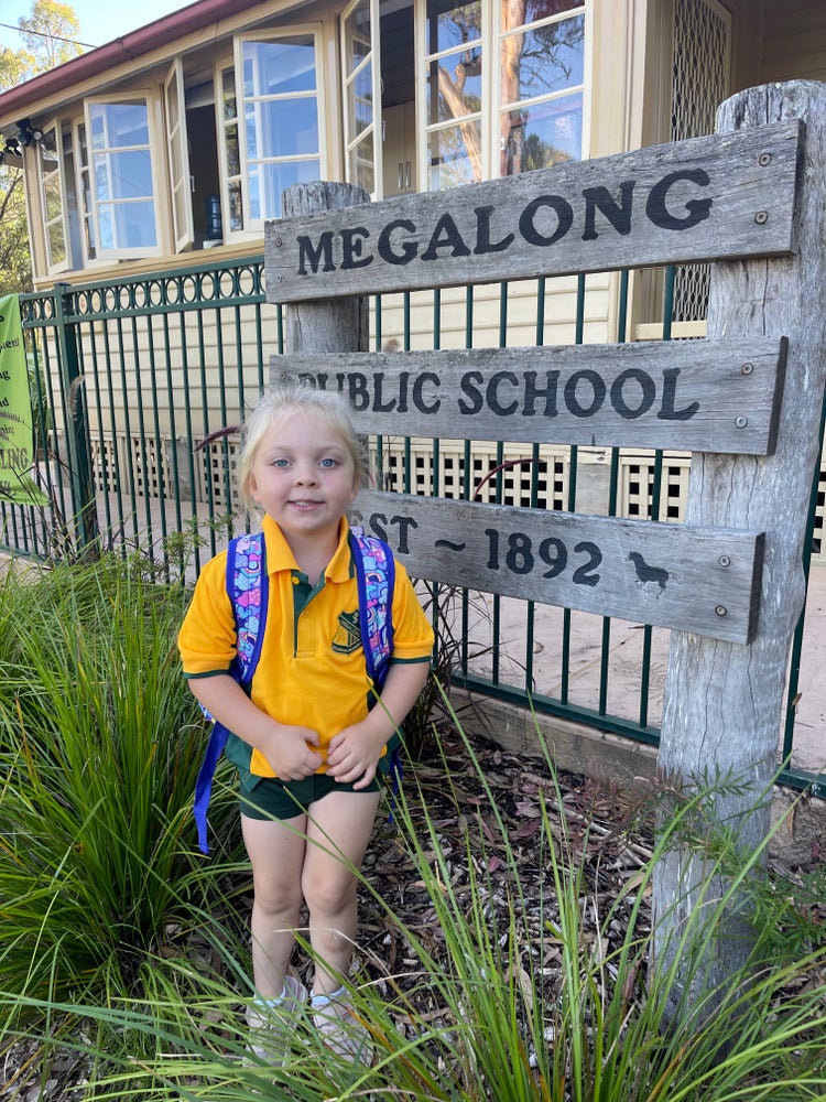 kindy student outside school on first day