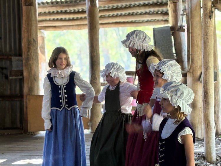 students filming in costume