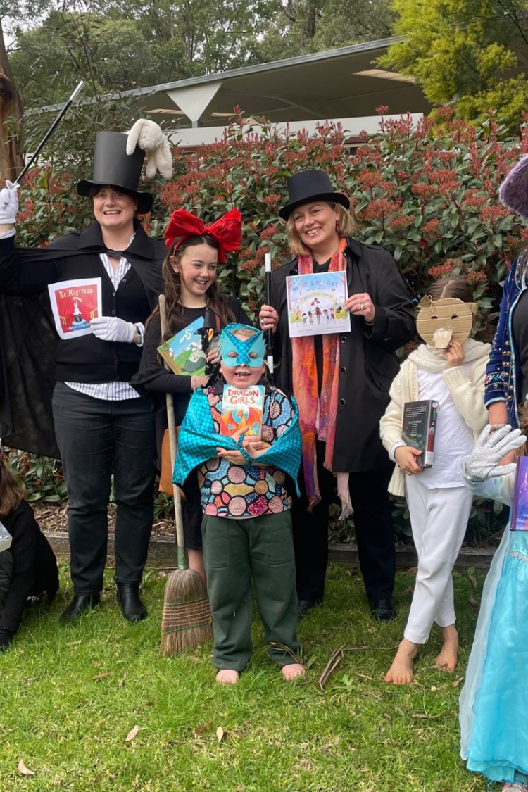 students and teachers dressed up for book week