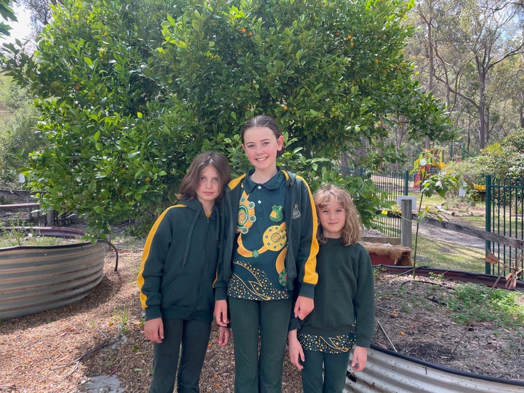 3 students in winter uniform